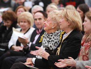 Members of Duane Acklie's family, including his wife Phyllis, pictured in the center, listen as NWU officials celebrate the new science center.